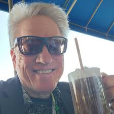 I found a photo of myself today, taken in Los Angeles in 1975. I'm sitting  in my backyard with my 1969 Martin D-28, the guitar I used to write all the  songs