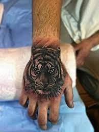 Tiger Hand Tattoo Tiger Hand Tattoo Hand Tattoos Cool Tattoos