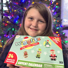 🎁✨ Countdown to Christmas with the Wigglitz Advent Calendar! ✨🎁 Madisyn  absolutely loves all the Christmas-themed Wigglitz toys, and this calendar  makes every morning so exciting. It comes with 24 surprise Wigglitz,