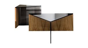 A beautiful thick glass top and two interlocking wood base pieces. Regolo Triangular Natural Wood Coffee Table Sovet