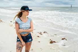 Wallpaper : Maggie Moodie, model, baseball caps, profile, Looking into the  distance, freckles, T shirt, belly, pierced navel, jean shorts, the gap,  women on beach, sea, windy, horizon, inked girls, tattoo, portrait,