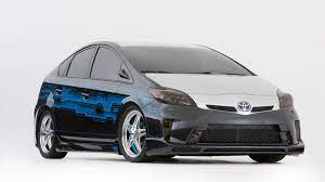 All of the things you see in the video (except for the tint) cost less. Custom Clint Bowyer Toyota Prius Prepared For Sema