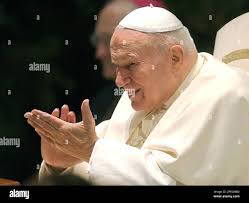 Pope John Paul II claps his hands during a weekly general audience in the  Paul VI Hall at the Vatican, Wednesday, Dec. 15, 2004. Pope John Paul II  lashed out against rulers