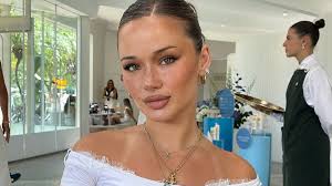 Would YOU wear this to the tennis? Influencer breaks 'dress code' at the  Australian Open as she attends in tiny nipple-baring mini dress