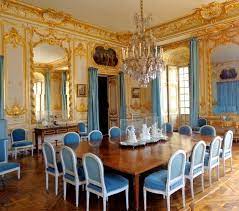 The table reflects highly decorative base with oversized scrolled feet, upholstered and tapestried chairs with the nail head trim accents, presenting a classic character and. Versailles Dining Room Palace Of Versailles Opulent Interiors Versailles