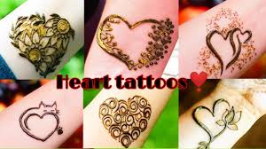 This tattoo is a clever play on the cliche melts my heart. floral heart. Beautiful Heart Shape Mehndi Tattoos Stylish Heart Tattoo Designs For Girls Boys Youtube