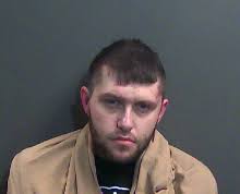 Police: Drugs, gun, thousands in cash found in Marion hotel room raid