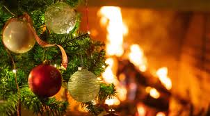 Christmas Tree Close Up On Blurred Burning Fireplace Background Siue Credit Union