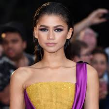 Using tweezers and lash glue, attach the metallic flakes around your eyes. Zendaya S Best Makeup Looks Of All Time Popsugar Beauty