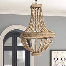 Pin By Alisha Richard On Light Fixtures Fh In 2021 Candle Style Chandelier Chandelier Wood Accents