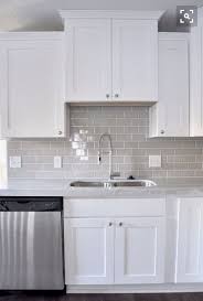 love the white shaker cabinets and gray