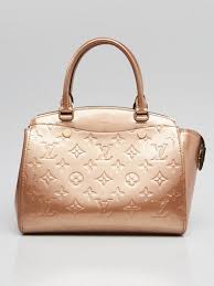 Real louis vuitton bags never come with authenticity card. Louis Vuitton Monogram Canvas Tivoli Pm Bag Yoogi S Closet