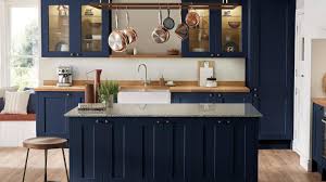 The tile floor is so incredible and the blue cabinets truly make the whole kitchen. Fairford Navy Kitchen Fitted Kitchens Howdens