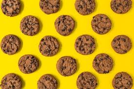 Play thousands of puzzle games for free, with new . Baked Chocolate Cookies On Yellow Background In 2021 Chocolate Cookies Yellow Background Bakery Chocolate Chip Cookies