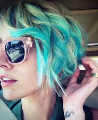 Dev Curly Golden Blonde Hairstyle Steal Her Style Teal Hair Highlights Teal Hair Hair Styles