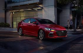 Even the interior door handles are made from black plastic. 2017 Elantra Sport In Red Hyundai Elantra Elantra Hyundai