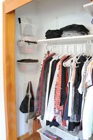 How To Organize A Small Closet For Maximum Storage Space Closet Clothes Storage Room Storage Diy Bedroom Storage