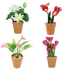 Here are 20 flowers that can withstand all the sun and heat that summer brings. Wonderland Set Of 4 Artificial Real Looking Flower Pots Lotus Calla Lilly Yellow Pink Flower Tulips Artificial Flower With Plastic Pot And Gravel Artificial Flower Artificial Flowers For Home Decor