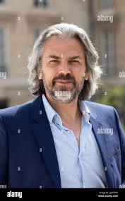 Deputy for La France Insoumise (LFI) Aymeric Caron arrives the French  National Assembly (Assemblee Nationale), in