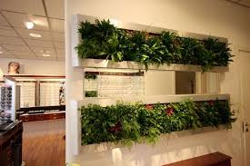 Exciting Half Wall Room Divider Design With Beautiful Green Indoor Plant Decoration Ideas For Living Room Of G Half Wall Room Divider Divider Design Walls Room