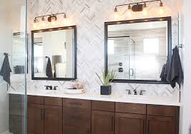 Spacious bathroom in luxury house. Custom Mirror Frames Framed Bathroom Vanity Mirrors