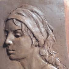 I’m brushing off some of the rough edges, this clay has a lot of grog but  I’m not trying for a smooth look so that’s fine with me.#bas relief  #portrait #clay#sculpture#art #figure