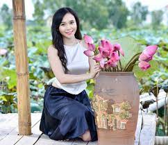 Ao yêm is a shirt, half way between the classical shirt and the bra. Traditional Ao Yem Custom Made White And Black