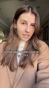Is this part of the artizia coat or a tag?? #fyp #aritziatag  #aritziatagdebate #aritziatryon