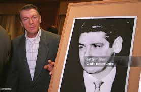 Richard DeSalvo with photo of his brother, Albert DeSalvo, at a... News  Photo