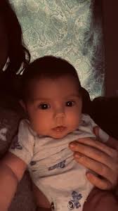 Who do y'all think she looks more like?