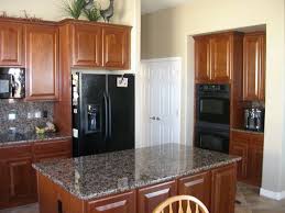 Cherry cabinets with black appliances. 140 Best Kitchens With Black Appliances Ideas Black Appliances Black Appliances Kitchen Kitchen Design