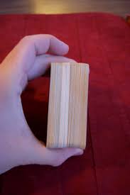 Sandwich the laminated strip in the middle, with the smaller strip of card at the top. Laminated Catan Cards 5 Steps Instructables