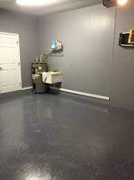All the information you need to make the right choice! Gray Painted Walls With Charcoal Epoxy Speckled Floor Basement Flooring Painting Basement Floors Gray Painted Walls
