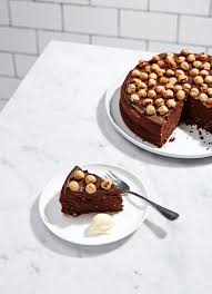 Tasty Tuesday Dark Chocolate With Hazelnut Cake Recipe By Jade Bentley Of Monsieur Truffe Photo By Sean Fennessy Styli Hazelnut Cake Desserts Cake Recipes