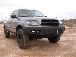 The existing storage unit located under the rear seat was used as the box for the subwoofer. 2000 2002 Toyota Tundra Front Base Bumper