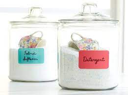 23 Things That Ll Help You Get The Laundry Room Of Your Dreams Laundry Storage Glass Canisters Laundry Room