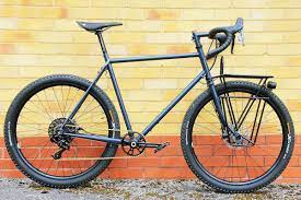 introducing the british built steel frame hand made bike for life the clandestine carrier steel bike gravel bike bicycles bicycle