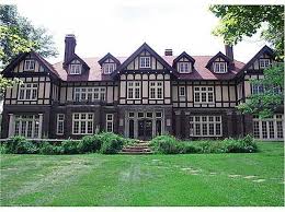 703 N 7th St Cambridge Oh 43725 Zillow Tudor Style Homes Mansions Tudor Style