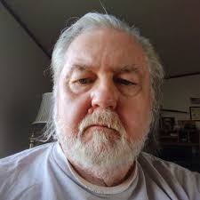 A Buck and a Doe in my front yard.