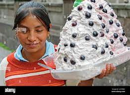 Woman Selling Espumillas Or Meringue In Quito Ecuador Stock Photo Alamy