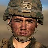 Technical Sergeant Thomas Payton, 56th Aerial Port Squadron, unchains cargo  coming from Fairchild Air Force Base (AFB), Washington, to March Air  Reserve Base (ARB), California. Due to repairs to the runway at