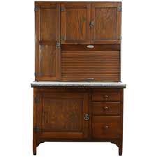The roll top cabinets come with impressive materials and designs that make your kitchen a little heaven. An Oak Hoosier Style Kitchen Pantry Cupboard With A Roll Top And Pull Out Enamel Work Surface D Kitchen Pantry Cupboard Wooden Kitchen Cabinets Pantry Cupboard