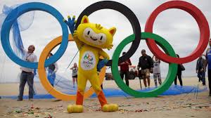 The olympic flag has a white background, with five linked rings in the centre. 2016 Rio Olympics Biggest Stars Dates Schedule Mascots Logo Usain Bolt Triple Triple Zika Eurosport