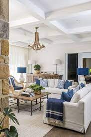 For more home decor inspiration, follow @countryliving on pinterest. 30 Best Coastal Living Room Decorating Ideas Blue Living Room Decor Decor Home Living Room Blue Living Room Color