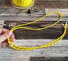 Wrapped paracord water bottle holder. Diy Paracord Water Bottle Holders Carla Schauer Designs