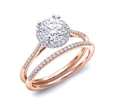 Double halo pear ring with 3.95ct of diamonds in 14ct white gold and 14ct rose gold. Delicate Round Diamond Halo Rose Gold Engagement Ring