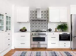 To go contemporary, pair your white cabinets with black hardware. 21 White Kitchen Cabinets Ideas For Every Taste