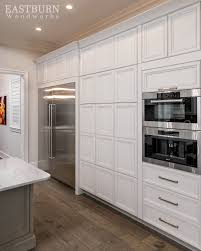 White Painted Kitchen Cabinets With Stainless Steel Appliances Cabinet Doors Are Push To Open Aka Open Kitchen Cabinets Kitchen Cabinets White Kitchen Design