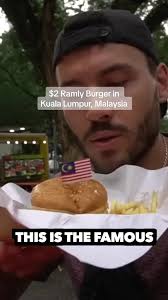 My first ever Ramly burger! #ramlyburger #malaysia #ramly #kualalumpur  #fypp #traveltiktok #malayfood #malaysiatiktok #aroundtheworld  #malaysianfood