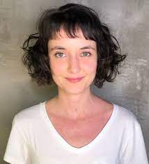 Our review includes short haircuts and hairstyles with short and elongated bangs, interesting hair color solutions and hair texture ideas for straight and curly hair. 50 Best Haircuts And Hairstyles For Short Curly Hair In 2021 Hair Adviser